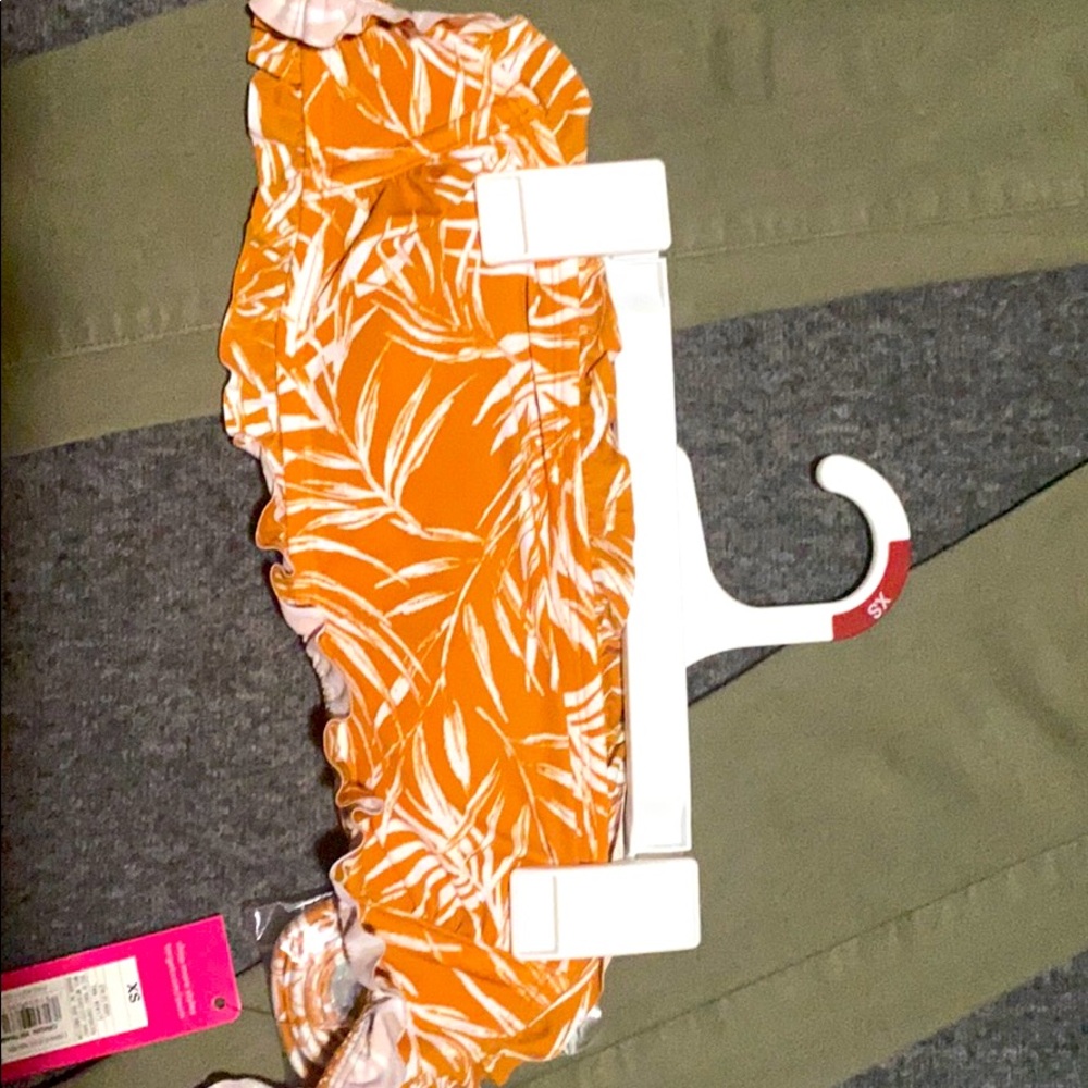 A strapless orange and white floral bikini top!